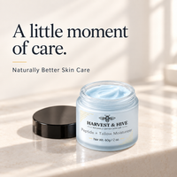 Open Harvest & Hive balm with its black lid on an ivory surface. Naturally Better Skin Care.
